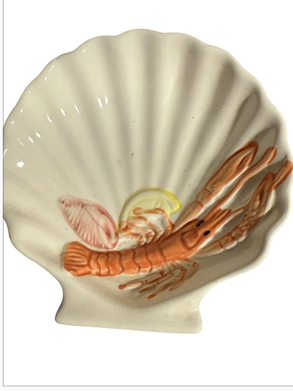 vintage Bassano ceramic lobster dish shaped like a scalloped seashell, featuring